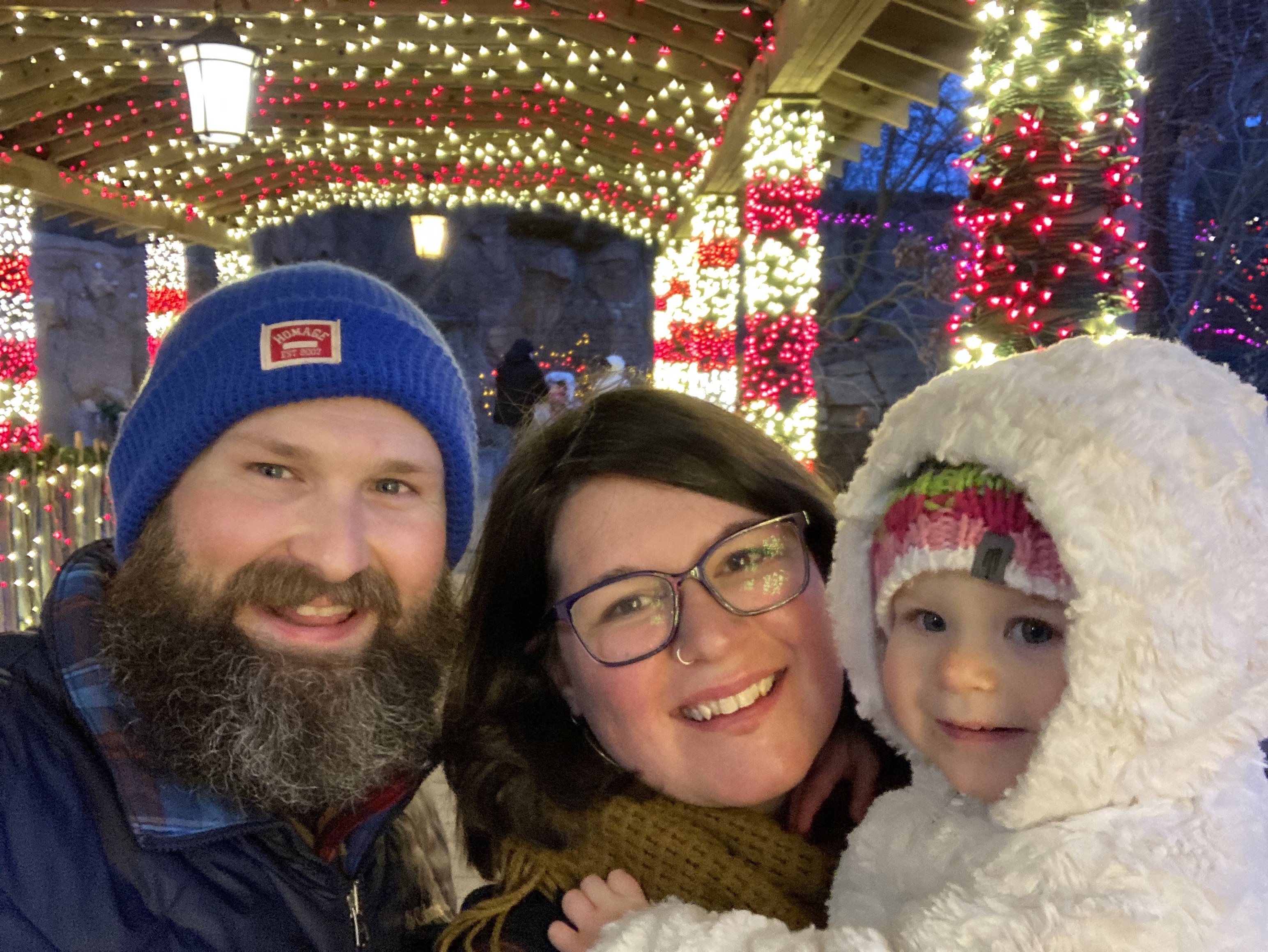 Ryan, Annie, and Imogen at a holiday festival.